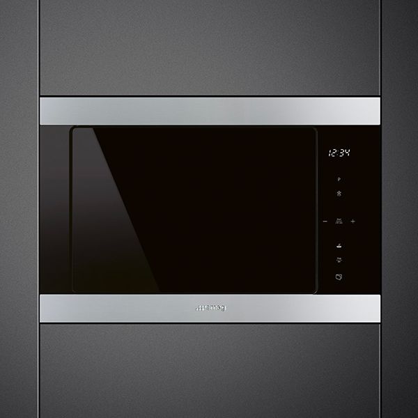 A built-in microwave oven in black with black glass and stainless steel top and bottom surround