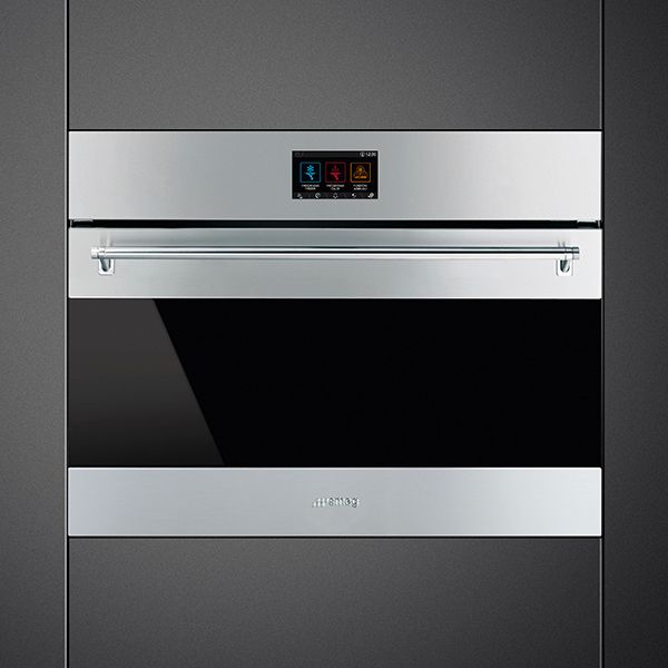 A stainless steel built-in blast chiller with stainless steel horizonal handle and black glass. Digital touch display
