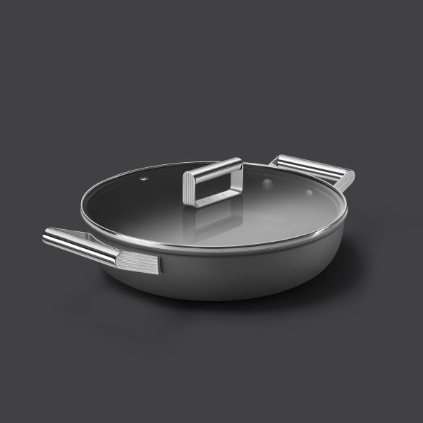 A non-stick, matt black shallow casserole pan with 2 silver handles, and a glass lid with silver handle.