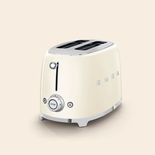 A cream 2 slot, 2 slice toaster in Smeg's iconic retro design with rounded edges